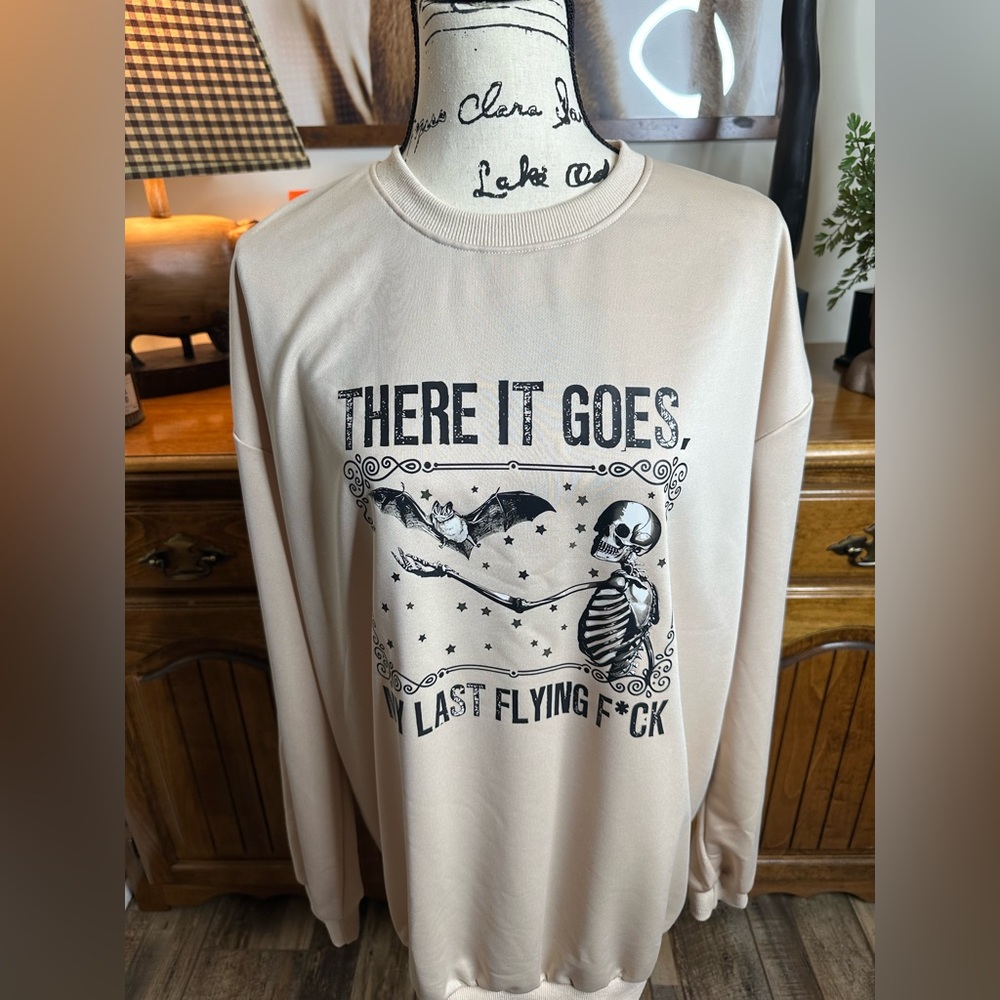 Beige Graphic Sweatshirt with Skeleton and Bat Design NWOT